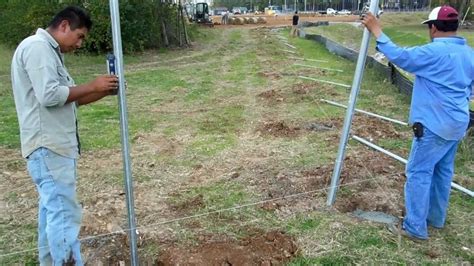 how to box in metal fence post|installing metal fence posts.